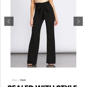 Black high waisted pants with tie.